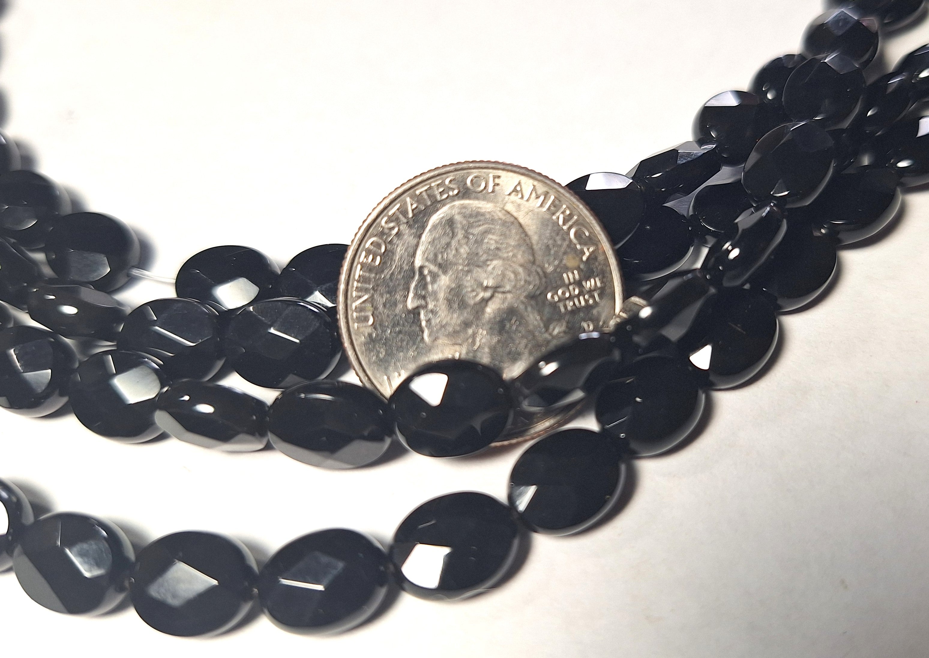 10x8mm Black Onyx Faceted Oval Gemstone Beads 16-Inch Strand