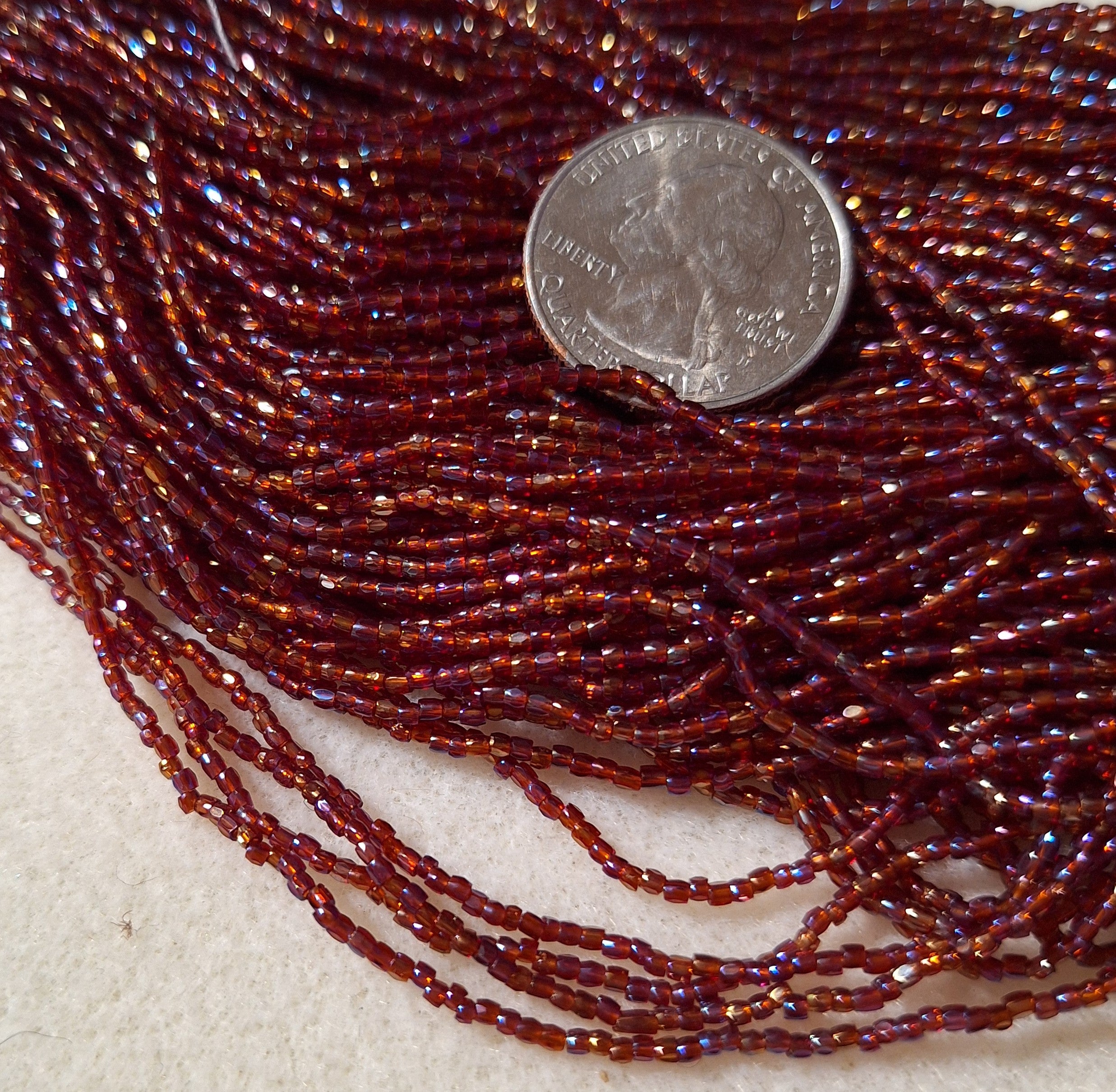 12/0 Ruby Transparent Iris 3-Cut Czech Seed Beads Full Hank