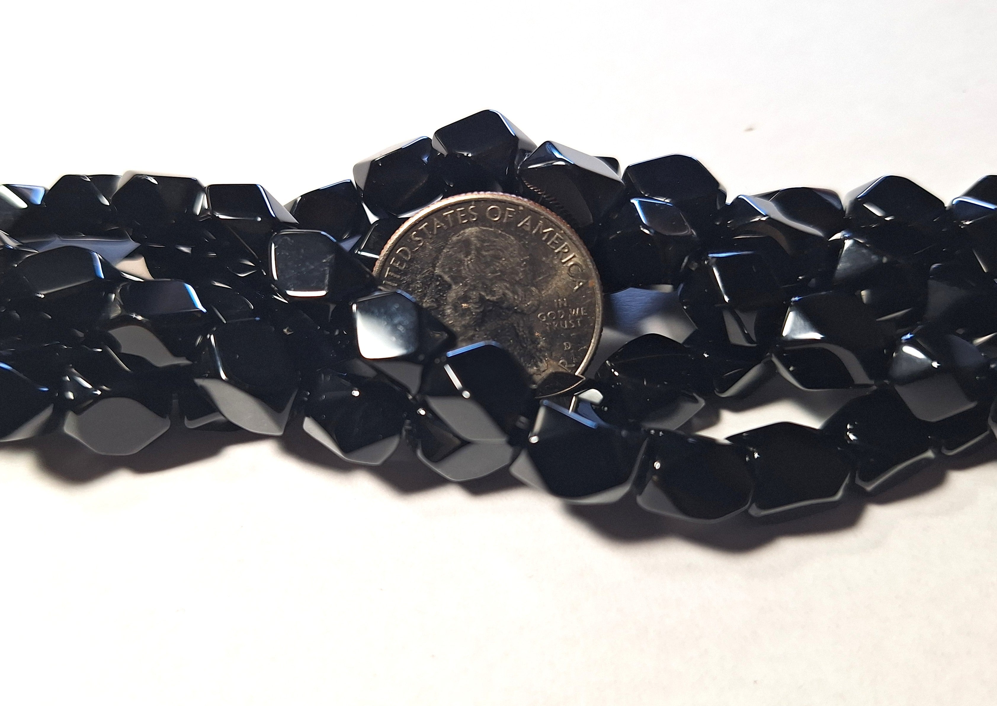 10x7mm Black Onyx Baroque Faceted Barrel Gemstone Beads 16-Inch Strand