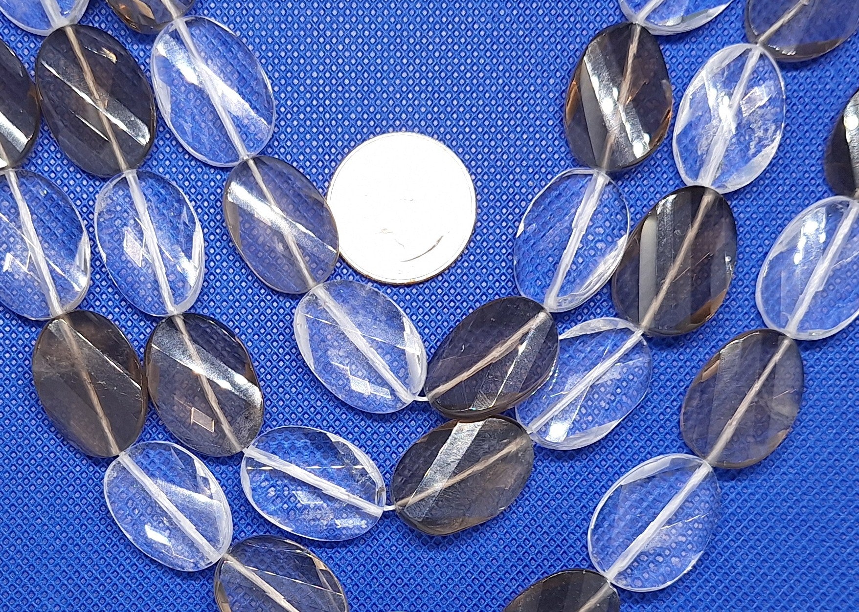 20x17mm Crystal Smoky Quartz Faceted Twist Oval Gemstone Beads 14-inch Strand