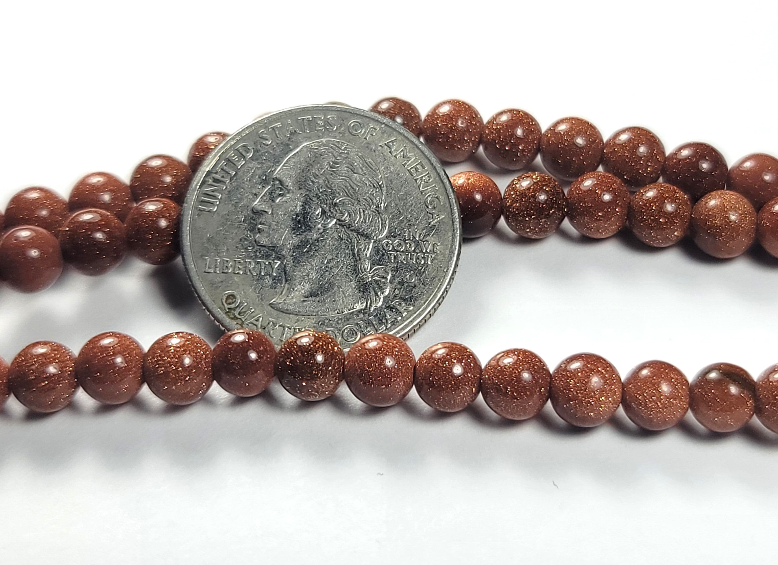 6mm Goldstone Round Gemstone Beads 8-Inch Strand