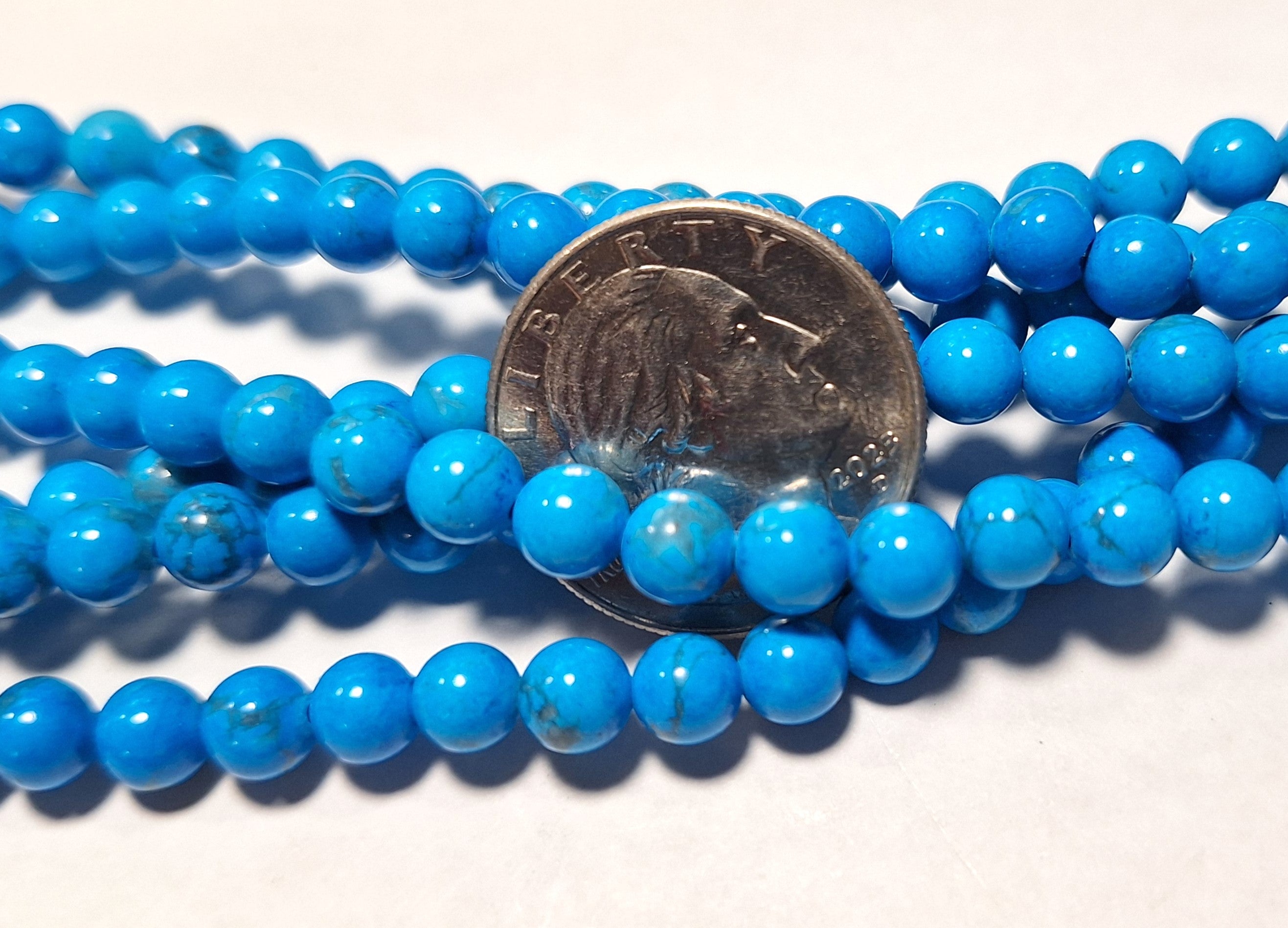 6mm Deep Sky Blue Dyed Howlite Gemstone Beads 16-Inch Strand