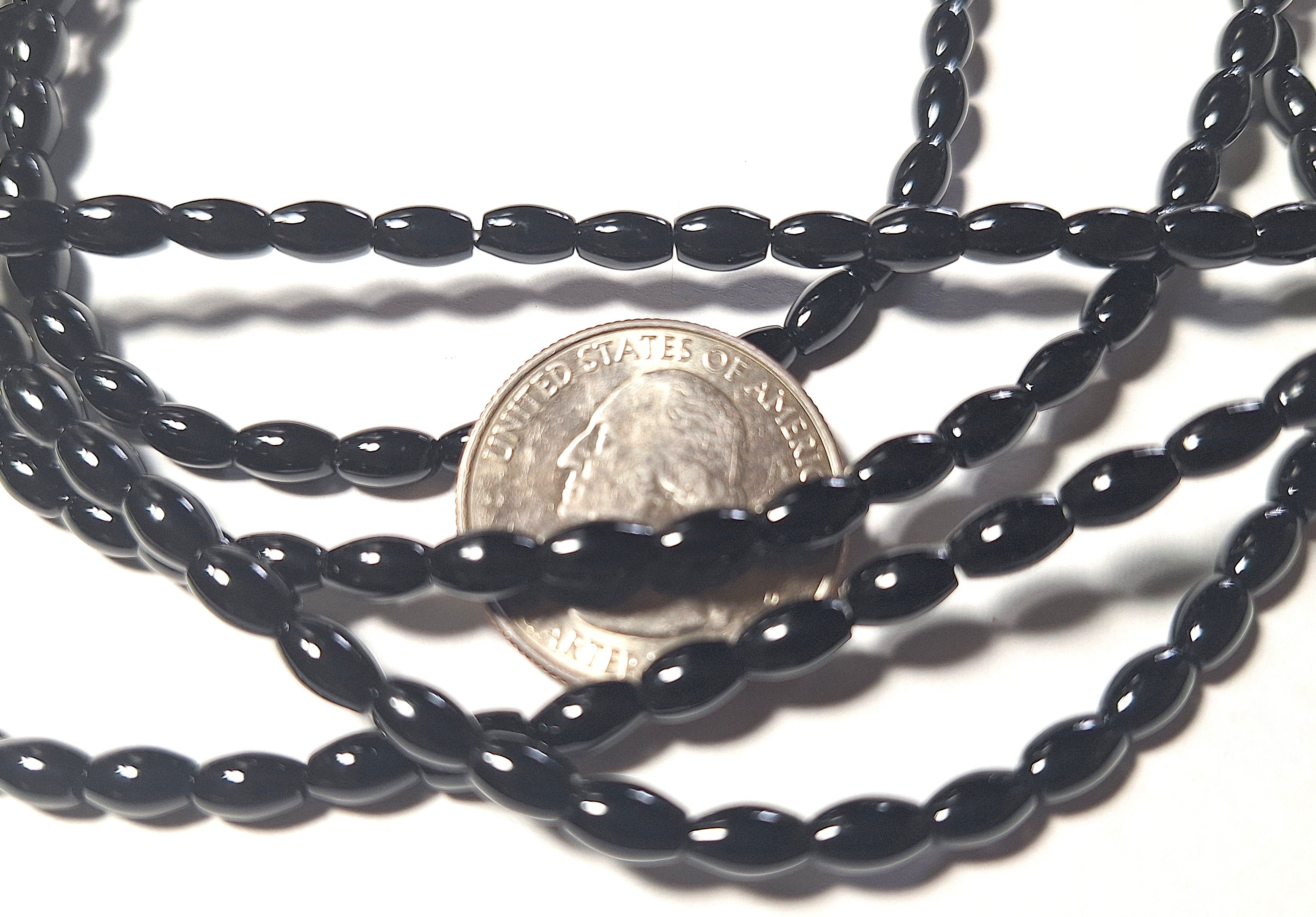 6x4mm Black Onyx Rice Shaped Gemstone Beads 16-Inch Strand