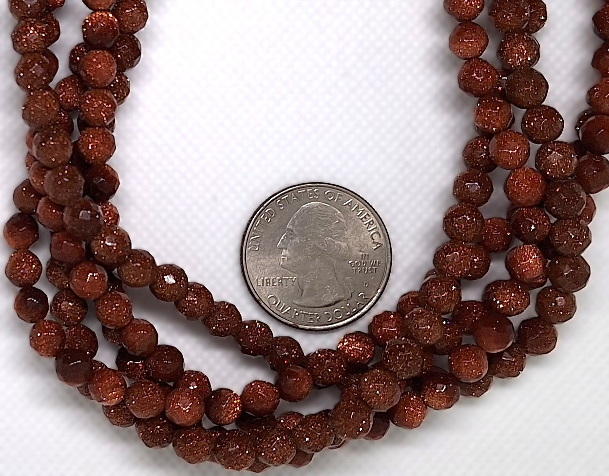 6mm Goldstone Faceted Round Gemstone Beads 16-inch Strand