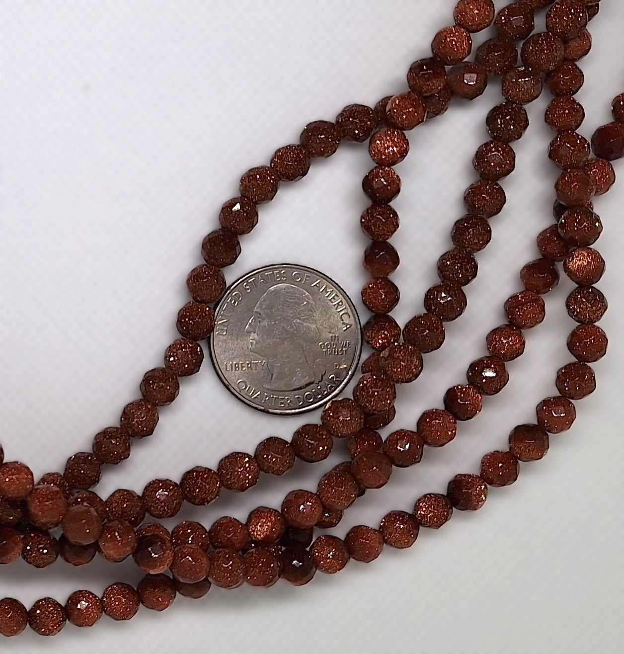 6mm Goldstone Faceted Round Gemstone Beads 16-inch Strand