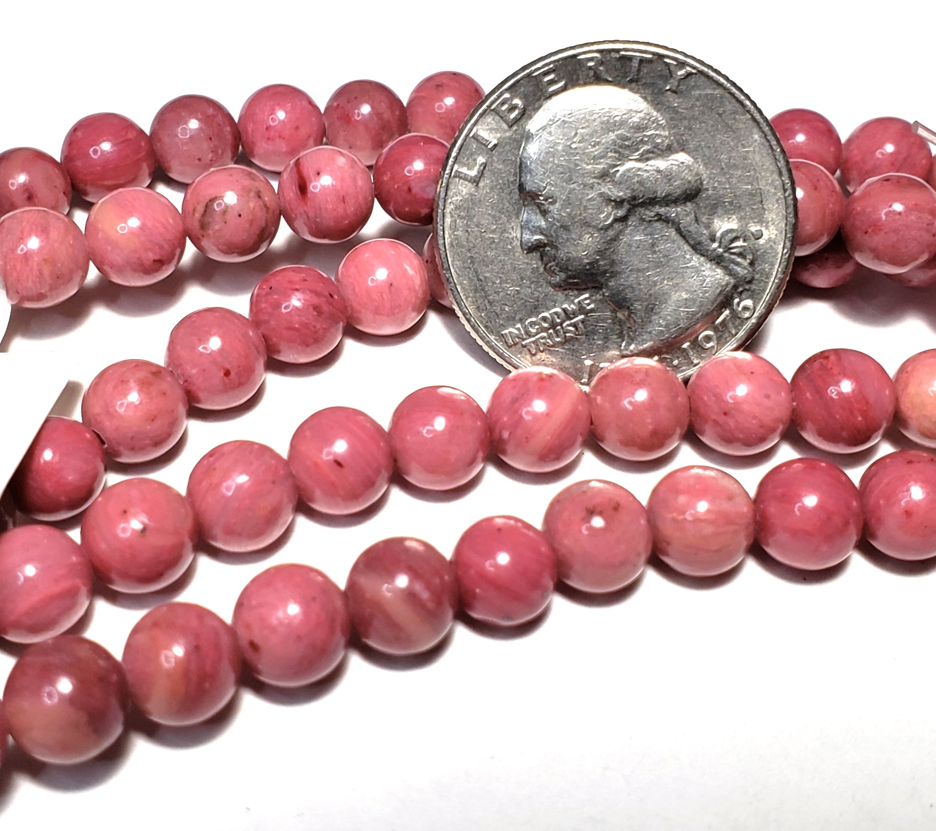 6mm Grade A Rhodonite Round Gemstone Beads 8-Inch Strand