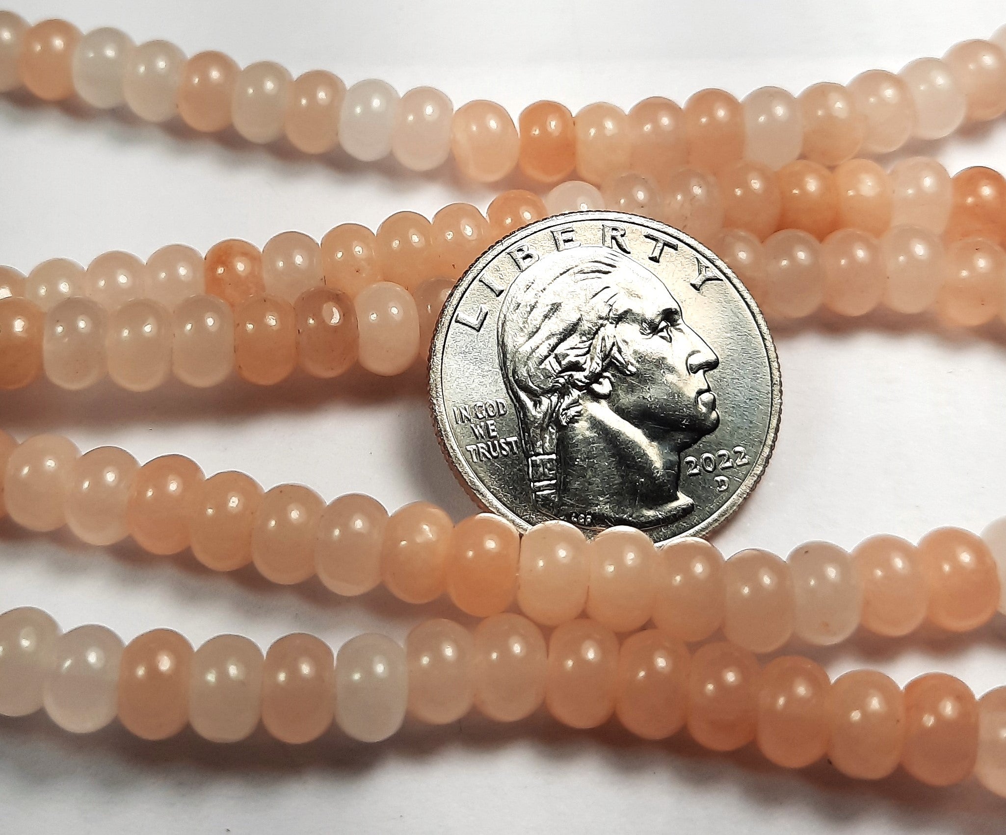 6x4mm Peach Aventurine Smooth Rondelle Gemstone Beads 8-Inch Strand