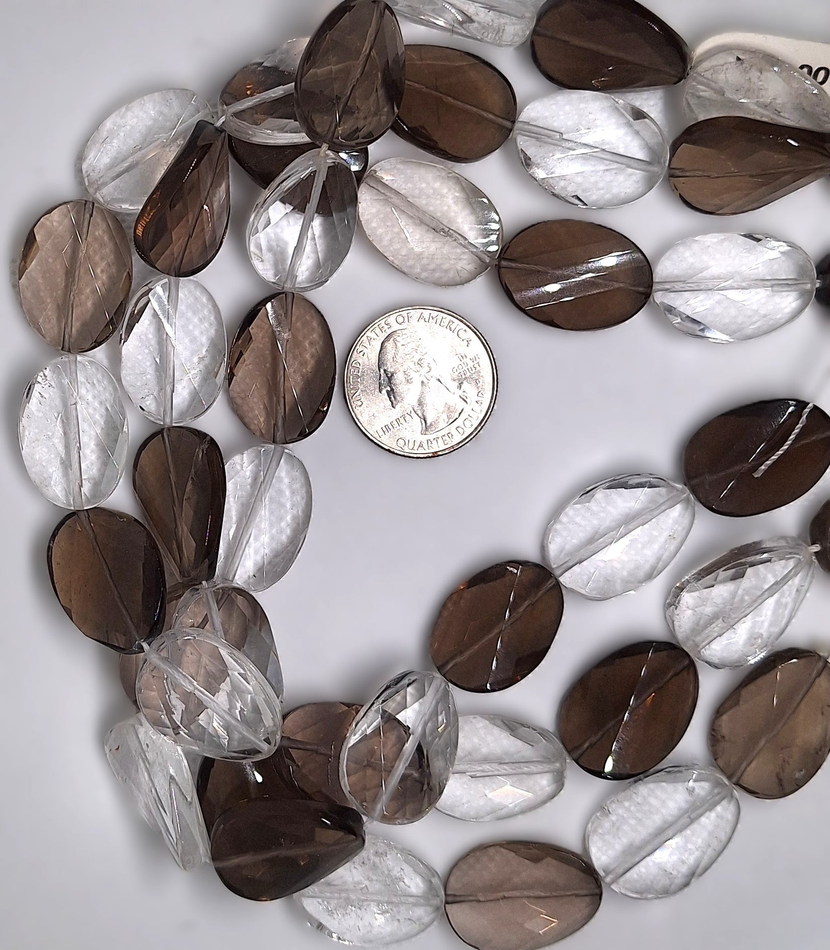 20x17mm Crystal Smoky Quartz Faceted Twist Oval Gemstone Beads 14-inch Strand