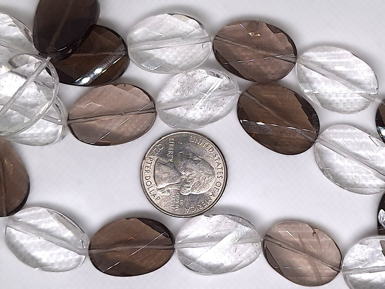 20x17mm Crystal Smoky Quartz Faceted Twist Oval Gemstone Beads 14-inch Strand