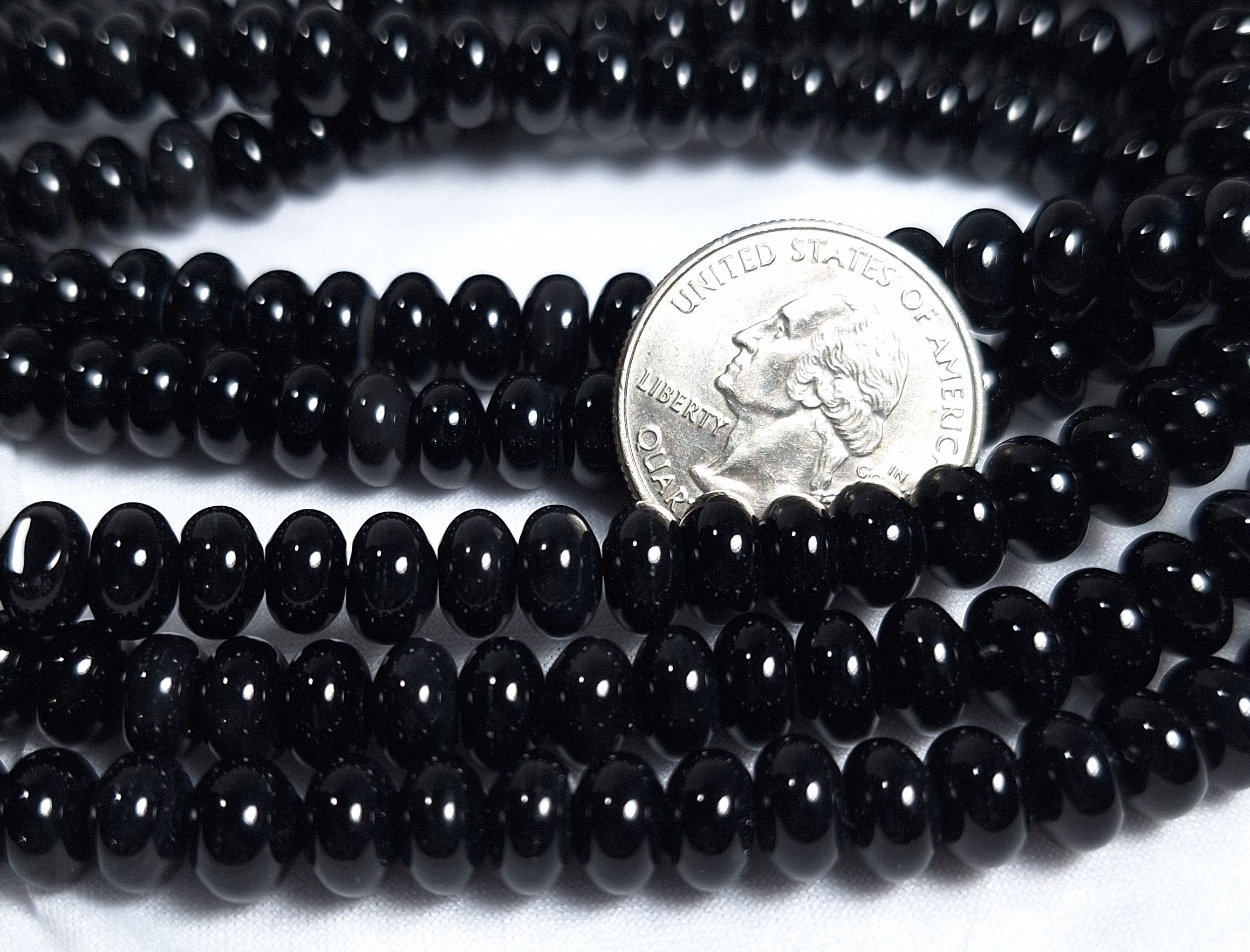 8x4mm Black Onyx Smooth Rondelle Gemstone Beads 16-Inch Strand