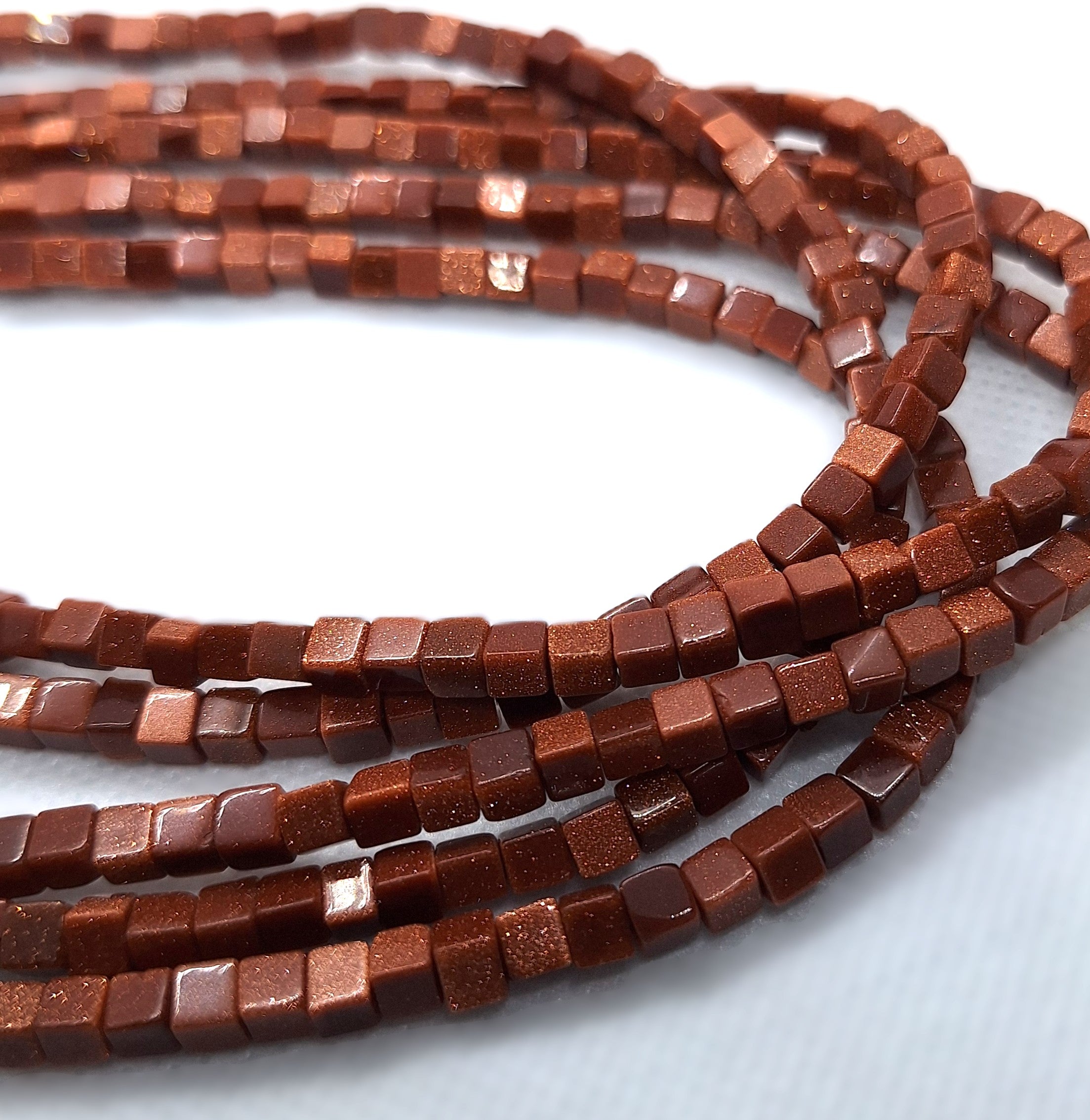 4mm Goldstone Cube Gemstone Beads 16-Inch Strand