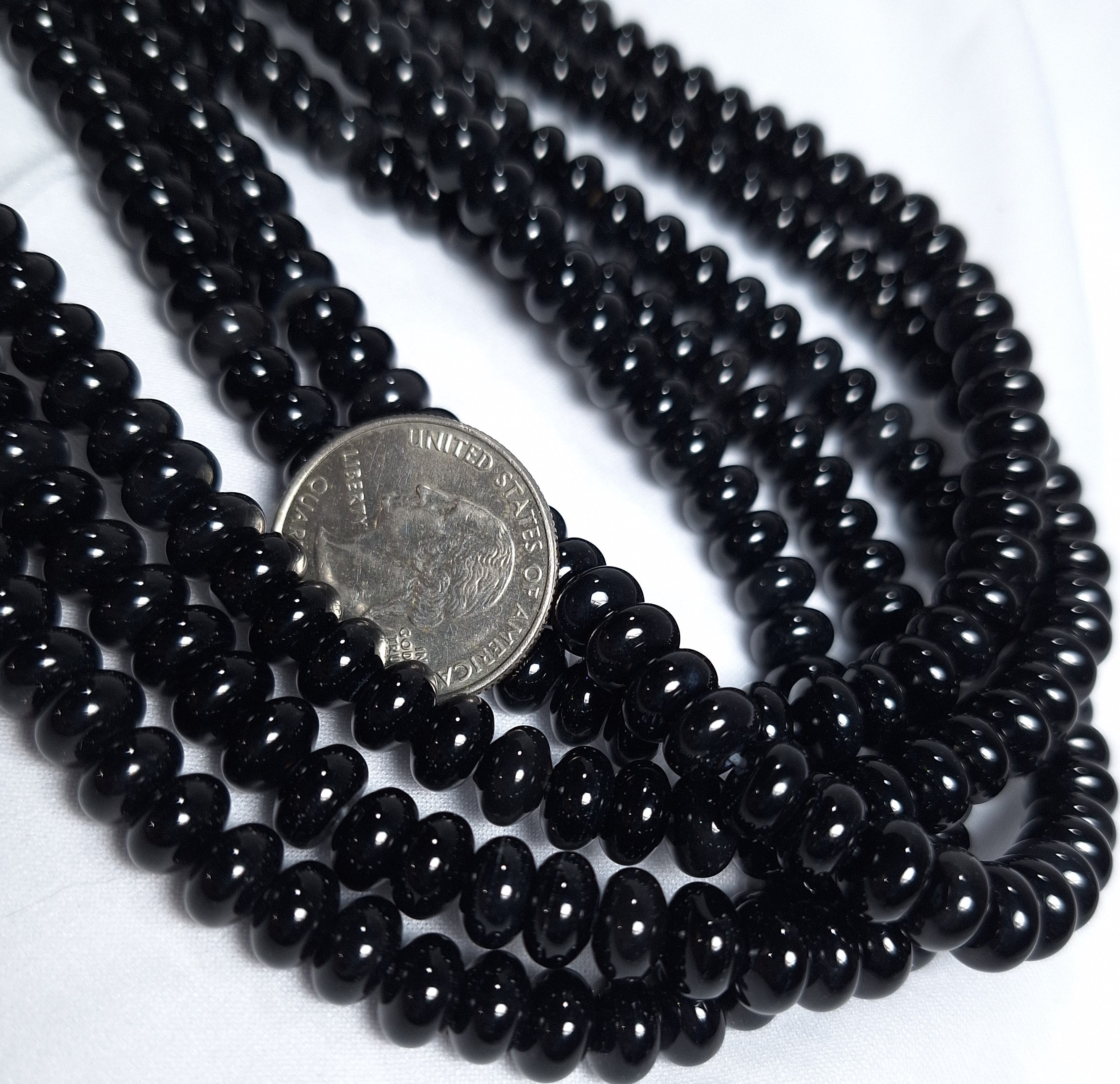 8x4mm Black Onyx Smooth Rondelle Gemstone Beads 16-Inch Strand