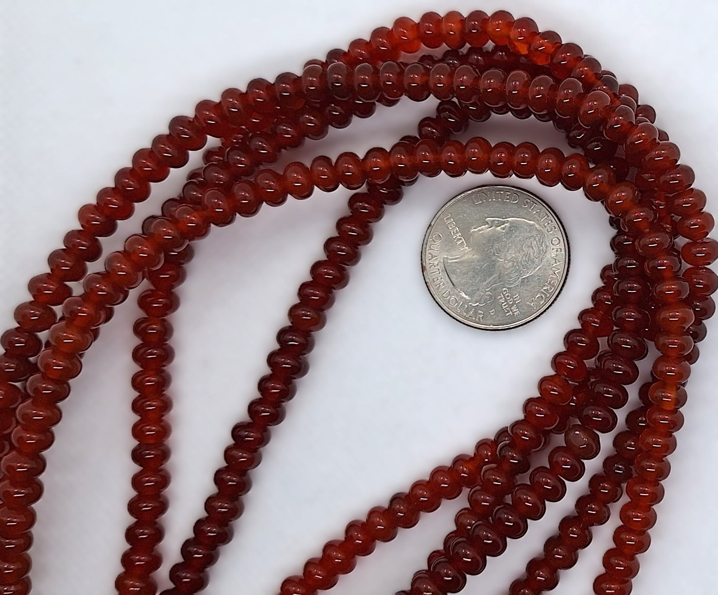 6x4mm Dark Carnelian Smooth Rondelle Gemstone Beads 16-Inch Strand