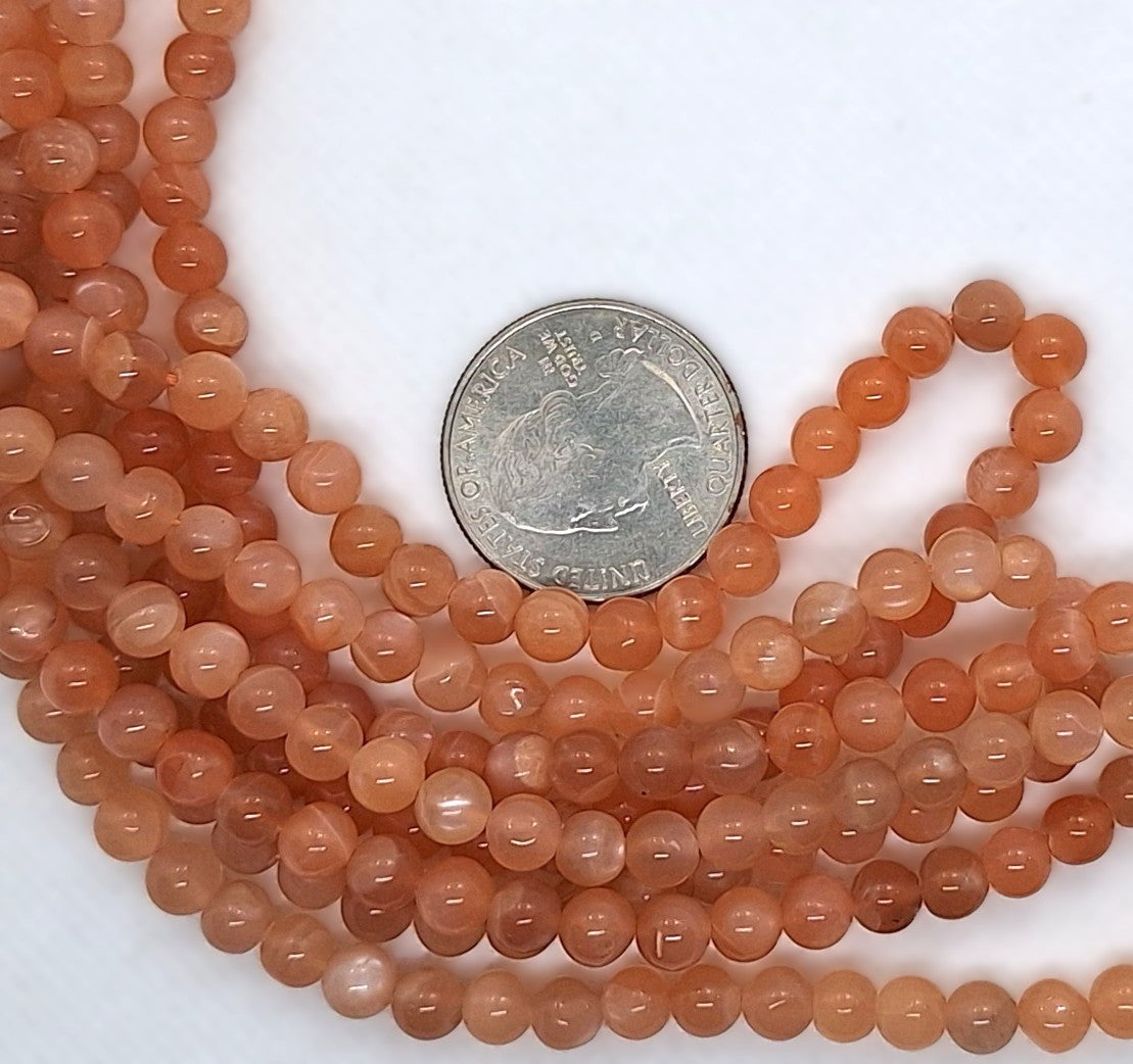 5-6mm Peach Moonstone Round Gemstone Beads 16-Inch Strand