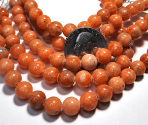 8mm Orange Calcite Round Gemstone Beads 8-Inch Strand