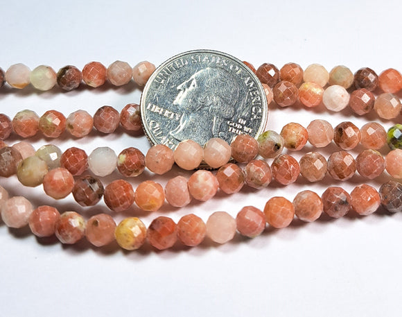 5mm Peach Stone Faceted Round Gemstone Beads 8-Inch Strand